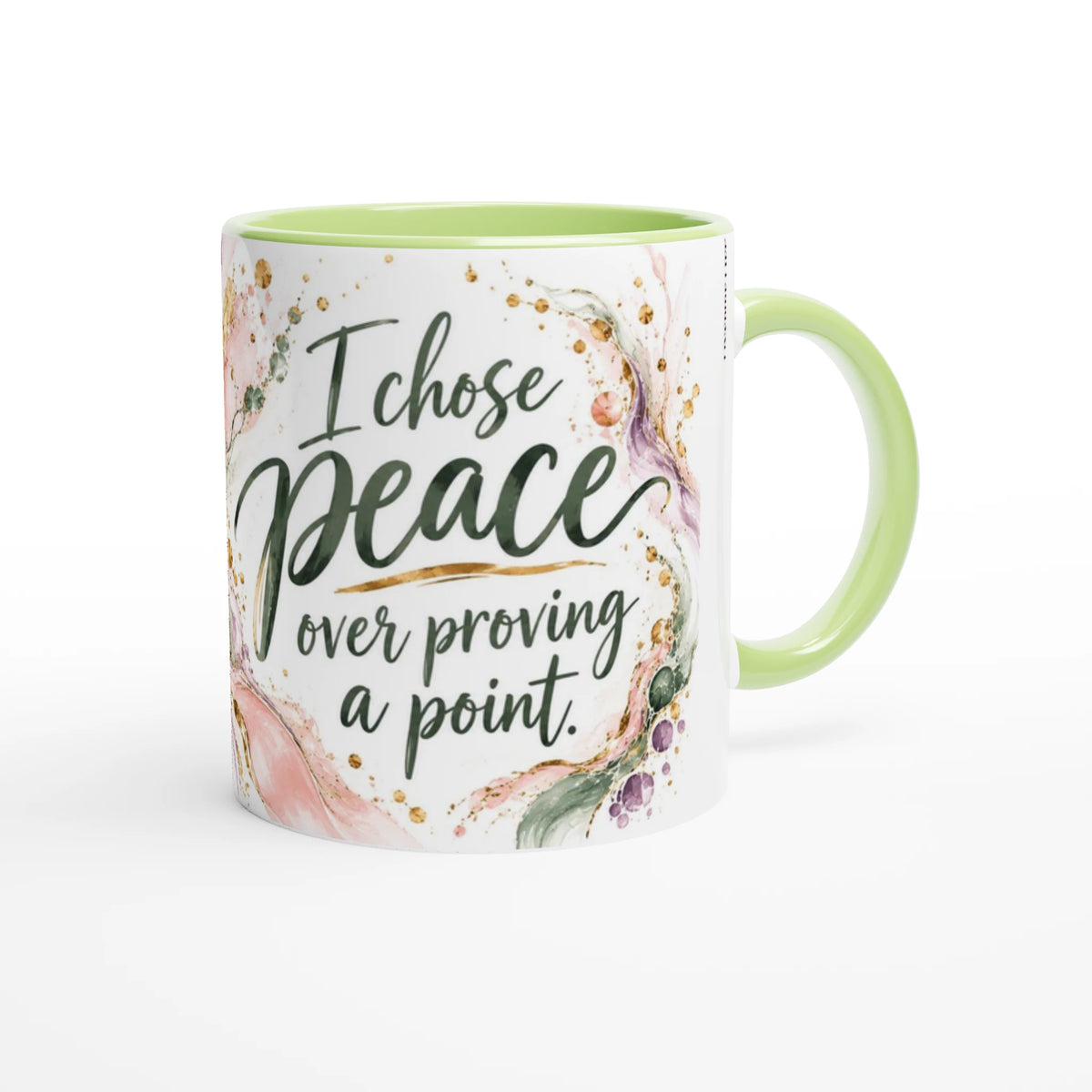 I Chose Peace 11 oz ceramic mug with a green handle and poured paint swirls in sage and blush, handle on the right