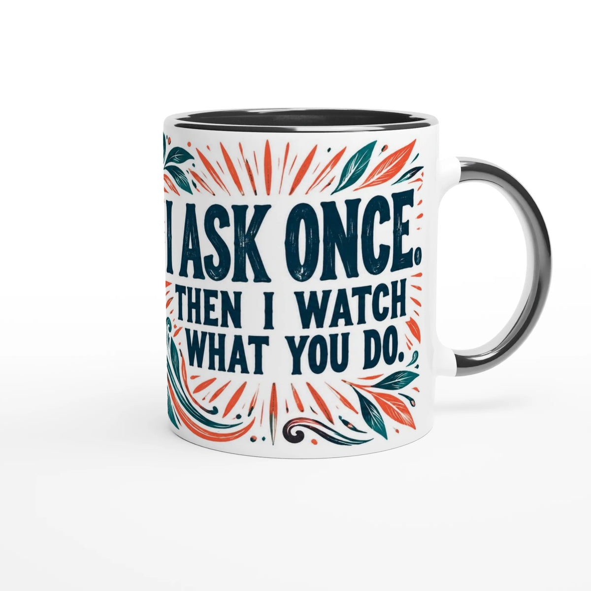 I Ask Once 11 oz ceramic mug with a black handle and linocut tropical leaves, handle on the right