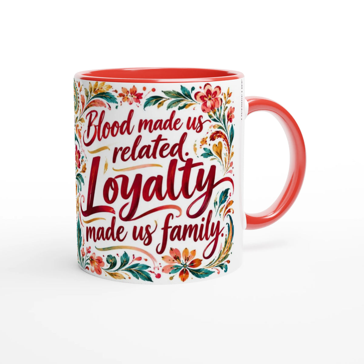 Loyalty Made Us Family 11 oz ceramic mug with a red handle and red, teal and gold paisley, handle on the right