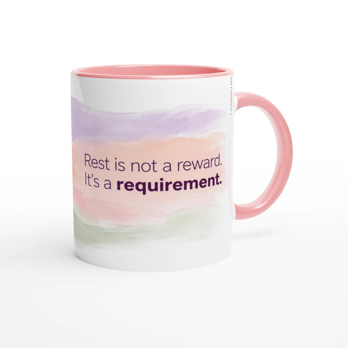 Rest Is Not a Reward 11 oz ceramic mug with a pink handle and soft bands of lilac, peach and sage, handle on the right